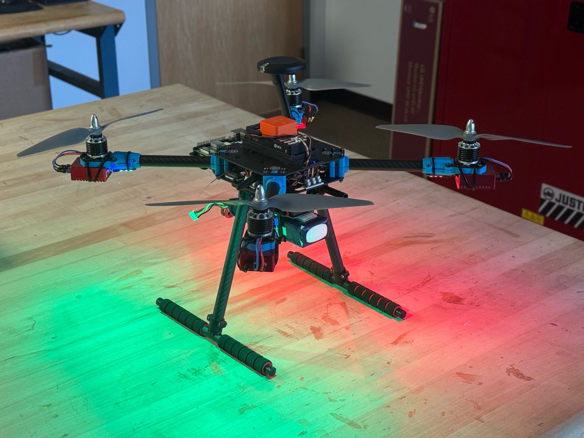 Instrumented multirotor research UAV on a laboratory workbench